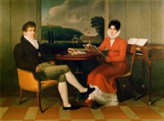 Wilhelm Titel (1784-1862). Double portrait of the composer Gaspare Spontini (1774-1851) and his wife Celeste (1790-1878). The landscape through the window is of Maiolati, Spontini’s birthplace near Ancona in Italy (now called Maiolati-Spontini). Signed, ‘G. Titel Sueco Pomerania Pinxit 1813’. (The ‘G’ is for the Italian version of Wilhelm; ‘Sueco Pomerania’ is Swedish Pomerania, Titel’s birthplace)/ Wikipedia/Pommersches Landesmuseum